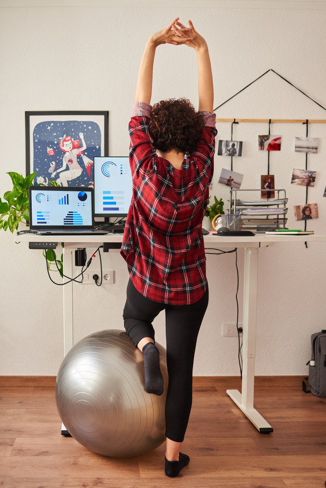 Stretching at standing desk
